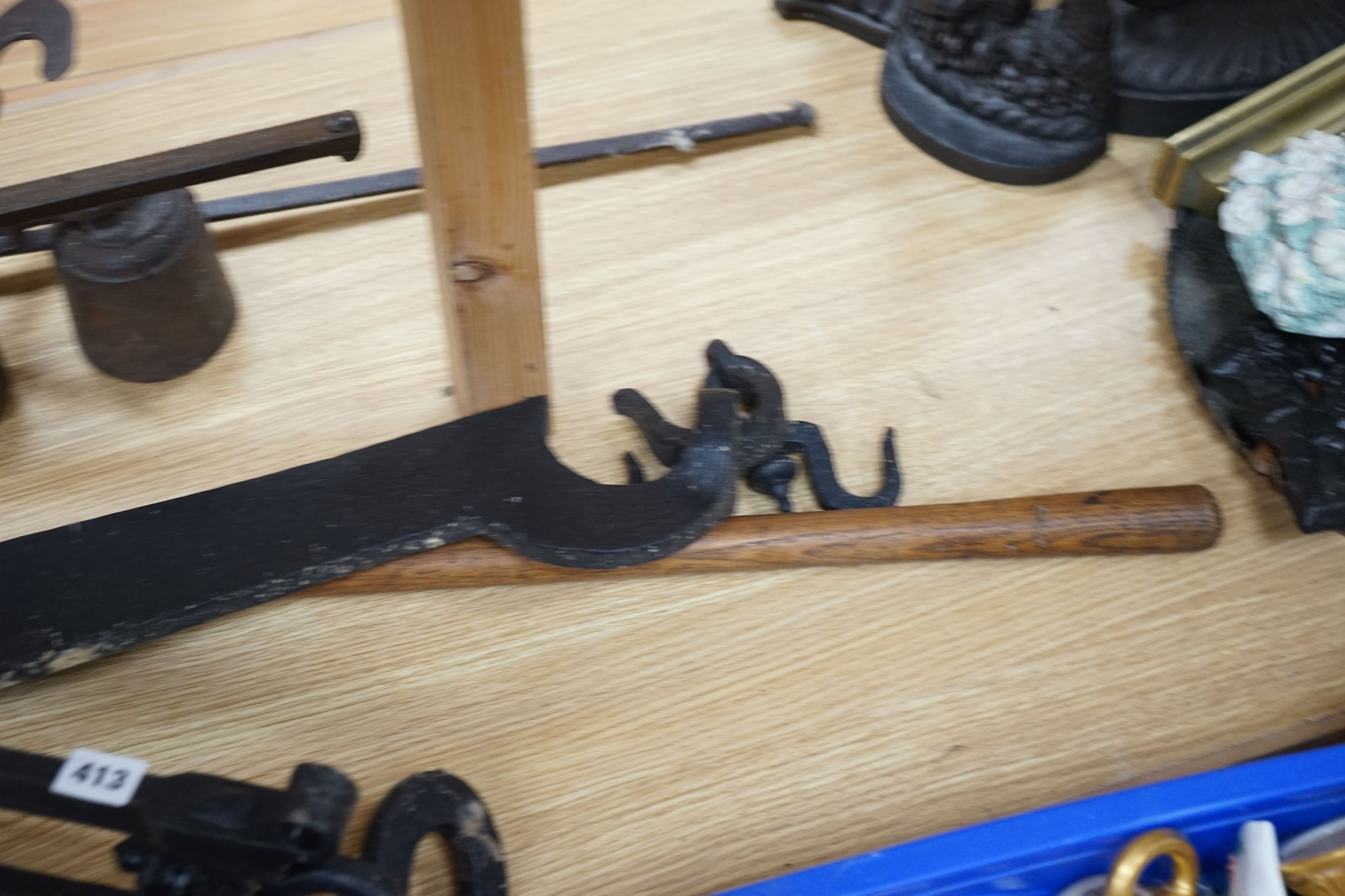 A large beam scale, brass scale: W &T Avery LTD and a similar cast iron scale, 103cm wide